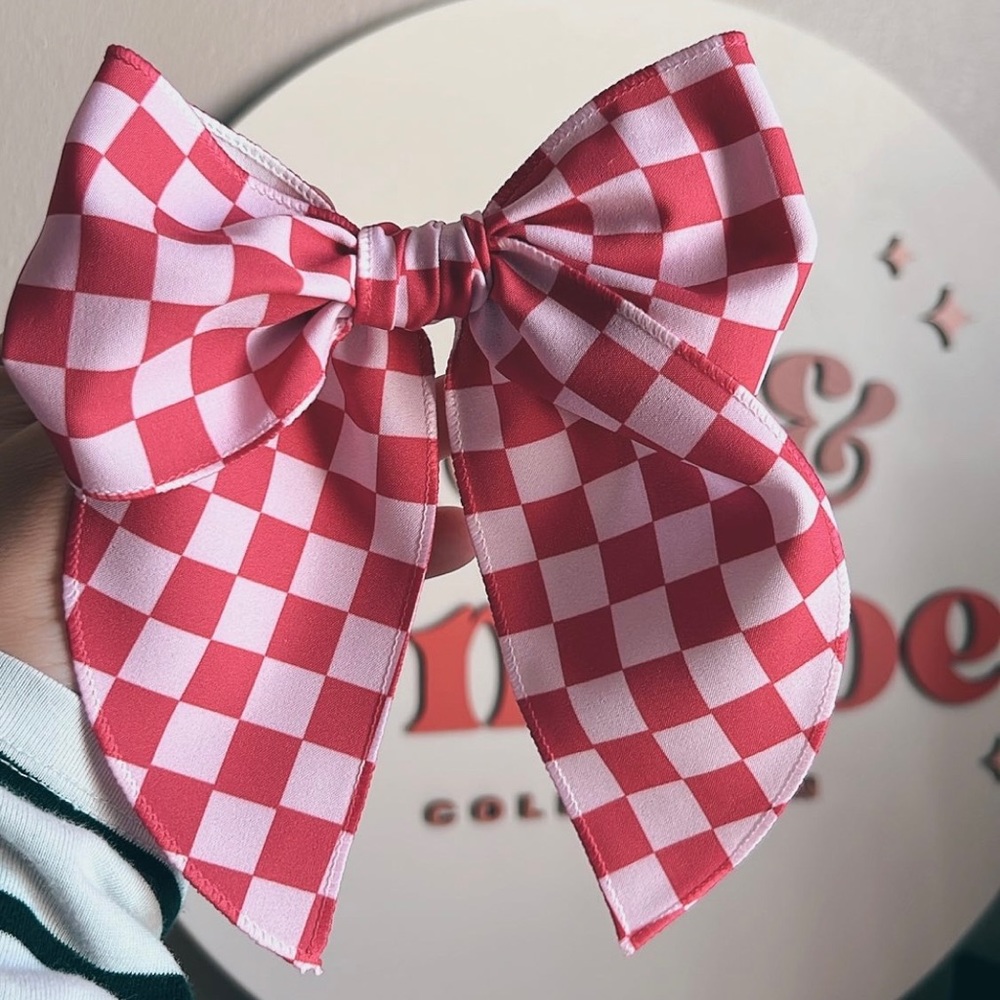 checkered magenta fable bow